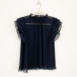 Black platted top by Anthropologie